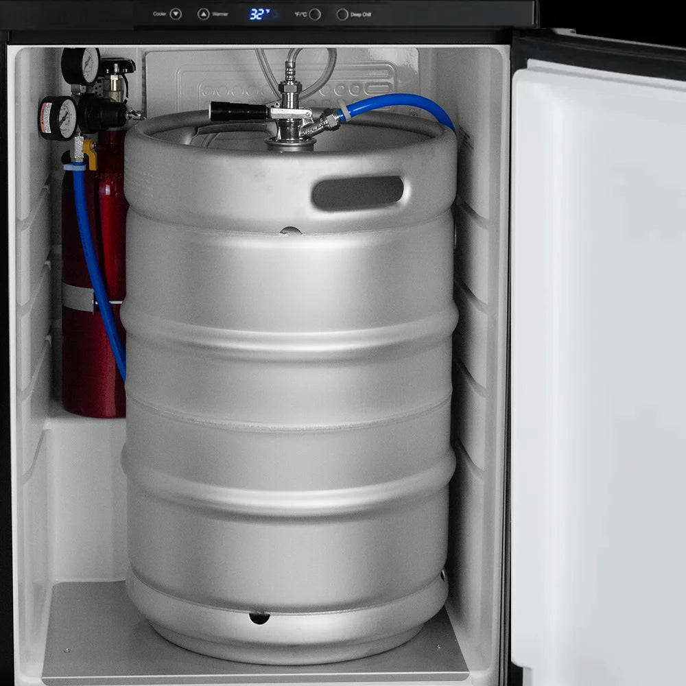 Full size keg tapped with a coupler beside a CO2 cylinder inside the Kegco K309 Digital Kegerator cabinet