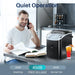 Quiet 40 decibel operation of the black Kismile Z5815NH Countertop Ice Maker beside a man on the phone